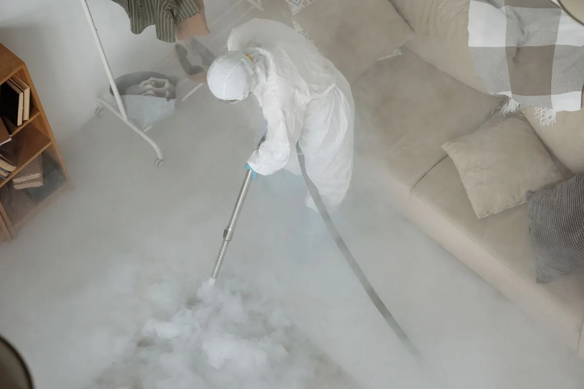 Biohazard cleanup technician in protective equipment, Congers, NY